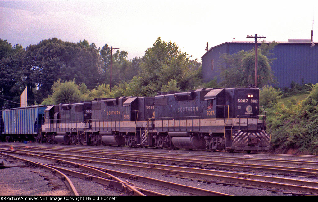A trio of GP38-2's, led by SOU 5087, bring a train into Glenwood Yard